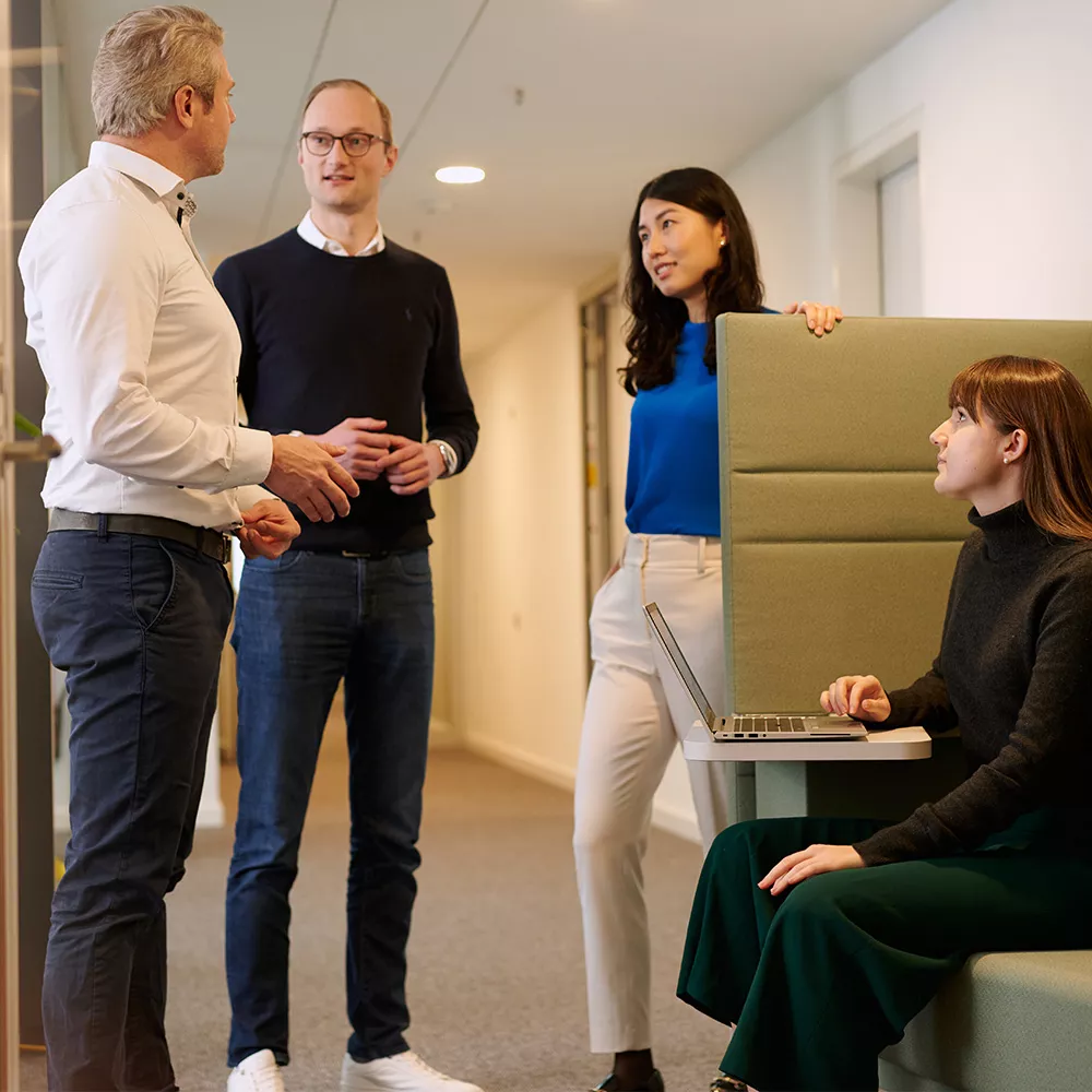 Female and male colleagues in the office in a discussion