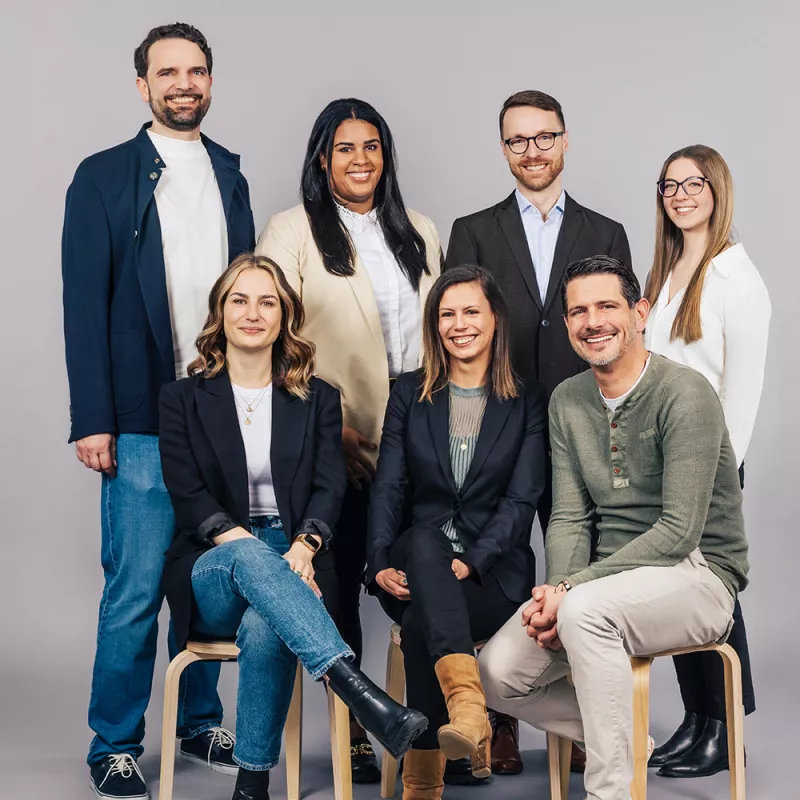 Portrait shot of colleagues from the HR department smiling at the camera