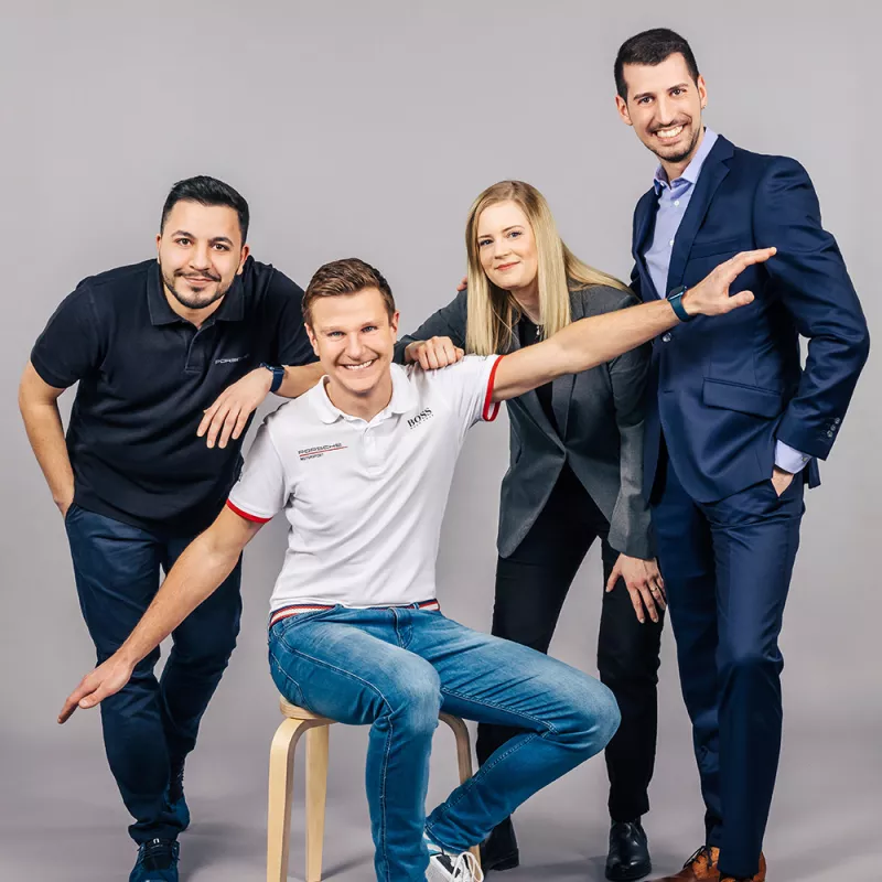 Portrait shot of colleagues from IT smiling at the camera